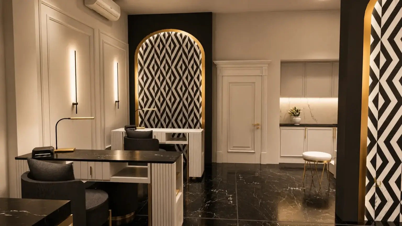 Dwa stanowiska manicure z ciemnymi blatami, tapicerowane fotele i podświetlana wnęka w łuku — salon kosmetyczny, Warszawa
